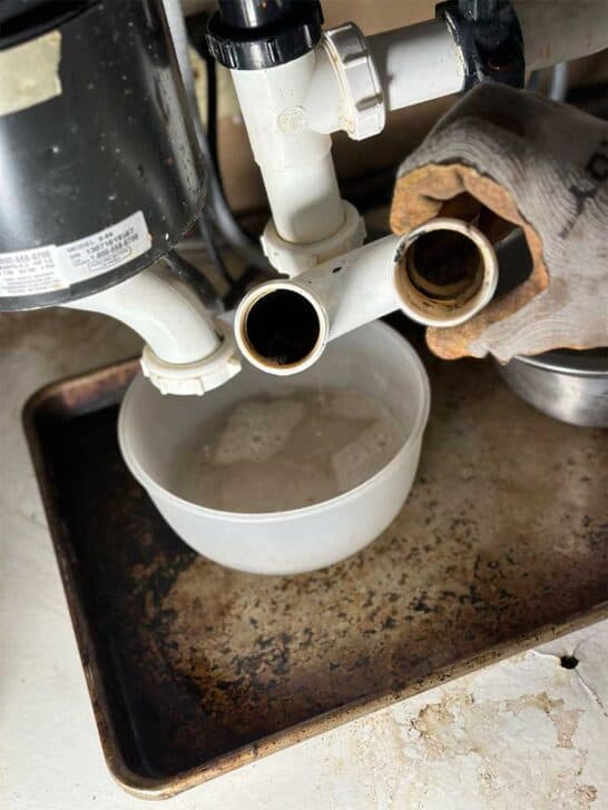 How to Fix a Kitchen Sink Clogged Past the Trap (Save Plumber Fees